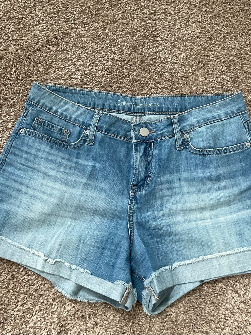 Calvin Klein Jeans faded blue denim cutoff shorts